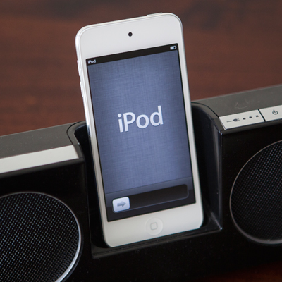 APPLE® iPod touch® - This iPod touch features a lightweight, super slim design with aluminum body in white.  Features include a 4-inch retina display and a 5-megapixel iSight camera for taking stunning photos, even in panorama, or record 1080p video. Discover music, movies, and more from the iTunes Store, or browse apps and games from the App Store. Also features the iOS 6 mobile operating system.